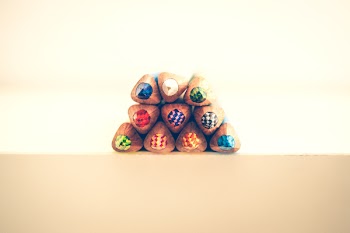 Assorted-color Colored Pencils on Beige Surface