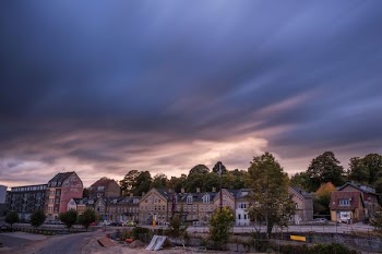 assorted-color houses under sky phenomenon
