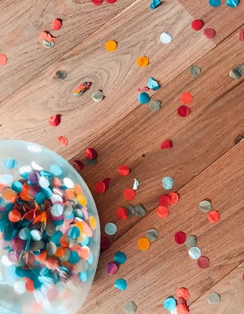 assorted-color of sprinkle dots on brown floor