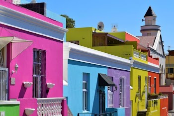 assorted-color painted houses in city