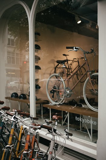 Assorted-color Parked Bicycles Beside Store