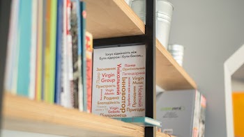 Assorted-color Textbook on Shelf