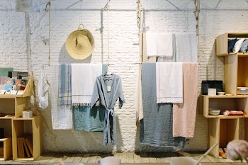 assorted-color towels hanging inside room
