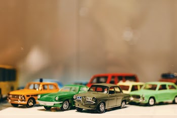 Assorted-color Toy Car Miniatures on White Surface