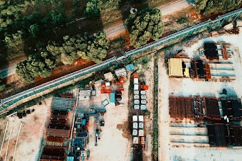 Assorted-color Vehicle Park on Open Field Aerial Photography
