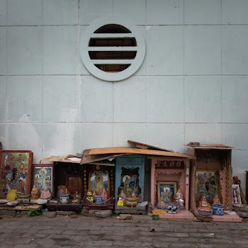 Assorted Figurines And Picture Frame On The Sidewalk