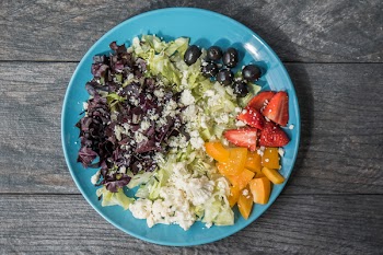 Assorted Sliced Fruits and Vegetables on Blue Ceramic Plate