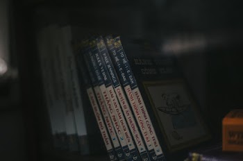 Assorted-title Textbook on Shelf