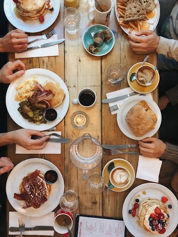 Assorted-variety of Foods on Plates on Dining Table