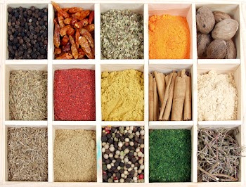 Assortment of spices for prepare tasty food on wooden box.