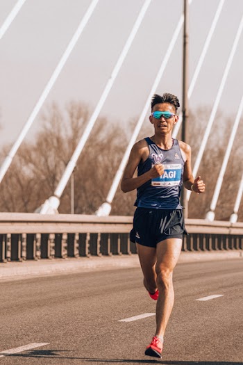 Athlete Man Running on Road Bridge