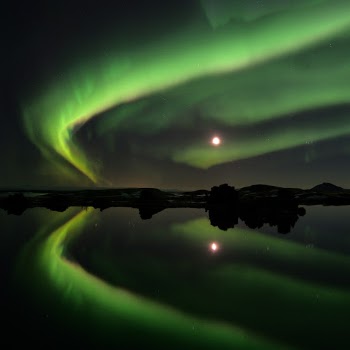 Aurora borealis on lake Myvatn, northern Iceland