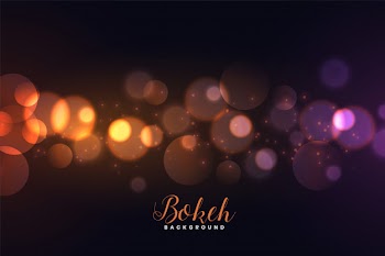 Awesome defocused bokeh lights background Free Vector
