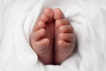 Babies Feet Selective Focus Photo