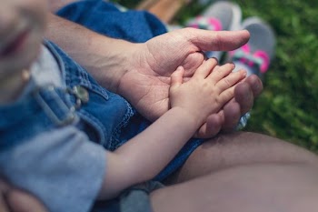 Baby And Father Hands