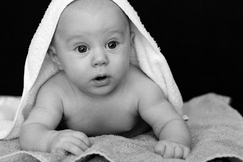 Baby Covered by White Towel Grayscale Photography