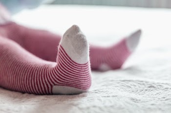 Baby Feet In Striped Socks