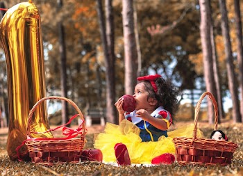 Baby Girl in Tutu dress sitting for  Birthday Photo shoot