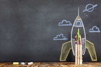 Back to School Concept with Hand Drawn Rocket on Blackboard