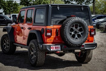 Back View Photo of a Parked Red Jeep Wrangler Rubicon