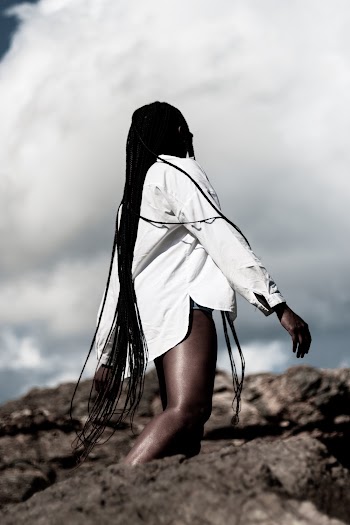 Back View Photo of Woman in White Shirt  Posing