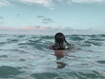 Back View Woman in Body of Water
