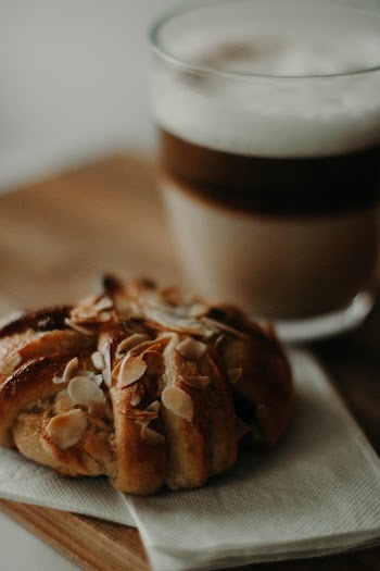 Baked Bread Beside Glass Mug