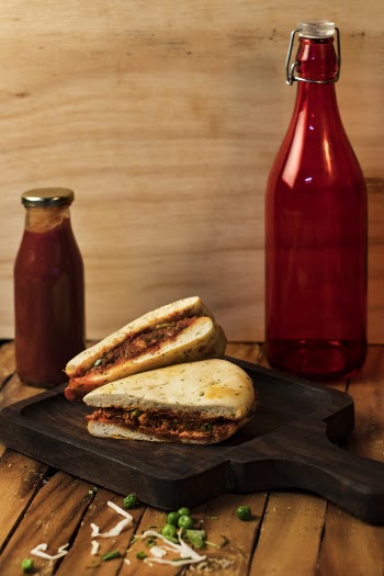 Baked Bread on Wooden Plate
