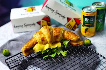 Baked Bread With Cheese and Curly Lettuce