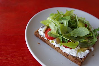 Baked Pastry With Cream and Salad on Top