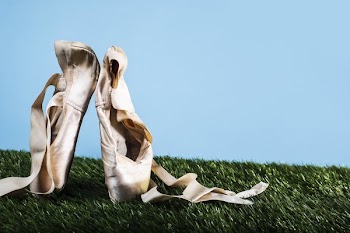 Ballet Slippers On Point In Grass