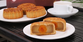 Banh trung thu - Vietnamese cuisine. This case is famous during Mid autumn season in Vietnam. Children will light up lanterns while adults eating moon cake and drinking tea. 