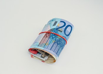 Banknotes on White Surface