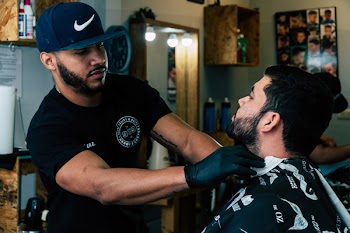 Barber Shaving His Costumer