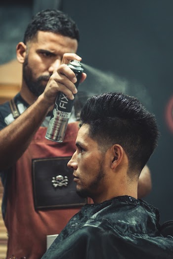 Barber Using Hair Spray
