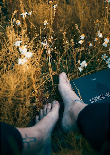 Barefooted Person on Grass