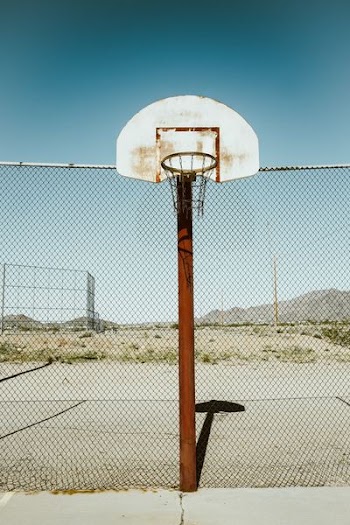 basketball hoop near fence