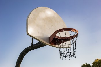 Basketball Hoops Under Clear Blue Sky
