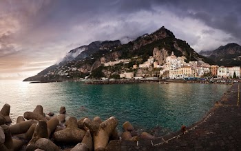 Beach With White Houses during Day Time