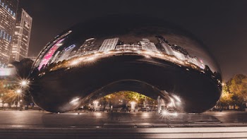 Bean-shaped Chrome-colored Landmark during Night