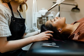Beautician giving eyebrow treatment to a… | Free stock photo | High Resolution image