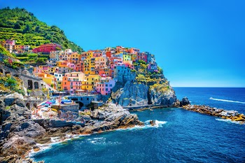 Beautiful colorful cityscape on the mountains over Mediterranean sea,...