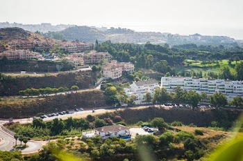 Beautiful landscape of a small spanish town for summer holidays. Mountains and white houses on the coast.