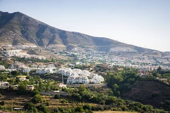 Beautiful landscape of a small spanish town for summer holidays. Mountains and white houses on the coast.