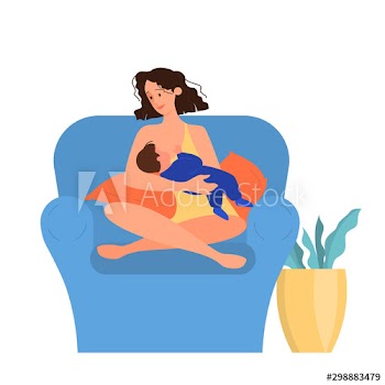 Beautiful mother breastfeeding her child