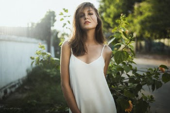 Beautiful sexy girl in white dress