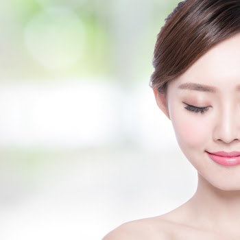 Beautiful Skin care woman enjoy and relax with green background. asian Beauty