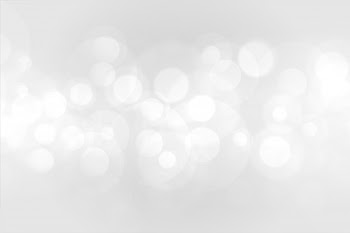 Beautiful white bokeh lights effect background Free Vector