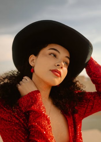 Beautiful Woman in Red Sweater and a Hat  · Free Stock Photo