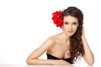 Beautiful woman with  red flowers
